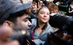 Swedish environmental activist Greta Thunberg was mobbed outside court