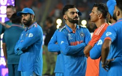 'Gives so much': India coach Rahul Dravid (in orange) stands with his players at the end of the game