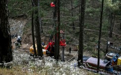 A vertical shaft from the forested hill above the tunnel is also being dug down 