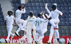 Bangladesh celebrate the  dismissal of New Zealand's Devon Conway