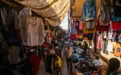 An estimated 16 million Ugandans -- one in every three -- wear used clothing
