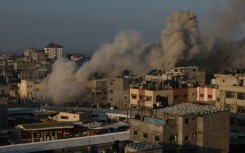 Smoke billows in Rafah following an Israeli air raid on December 1