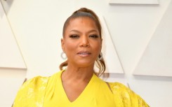 Queen Latifah, shown here at the Oscars in 2022, is among the 2023 Kennedy Center inductees 