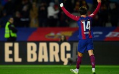 Barcelona forward Joao Felix celebrates scoring the opening goal against his parent club Atletico Madrid on Sunday in La Liga