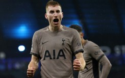 Dejan Kulusevski celebrates after scoring Tottenham's third goal against Manchester City