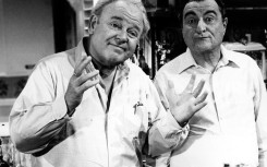 Actor Carroll O'Connor (L) portrayed bigoted patriarch Archie Bunker in the provocative TV series 'All In the Family,' for which Norman Lear made multiple pilots before the show was ultimately picked up by CBS in 1971 and became a prime-time smash