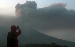 Mount Marapi on the island of Sumatra spewed an ash tower 3,000 metres into the sky on Sunday as scores hiked in the area