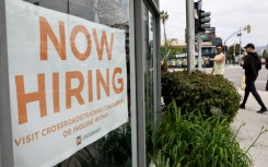 The US economy added more jobs than expected and the unemployment rate fell in November, but the strength in the labour market could push back the start of much-awaited interest rate cuts