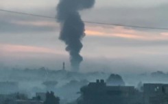 Smoke billows from Nuseirat in the central Gaza Strip after Israeli strike