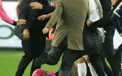 Referee Halil Umut Meler was attacked after awarding an added time penalty kick to the visiting team