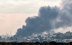 Smoke billows over the northern Gaza Strip during Israeli bombardment from southern Israel