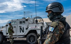 A Monusco peacekeeper looks on at the force's base during a field training exercise in Sake, eastern Democratic Republic of Congo in November 2023