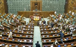 The suspended MPs had called for a debate over the December 13 incident when a man (bottom R) jumped down from a visitors' gallery and a smoke canister was released