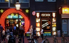 The planned 'erotic centre' will replace the centuries-old red light district with its neon-lined windows