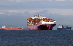 A container ship waits to enter the Panama Canal on September 24, 2023