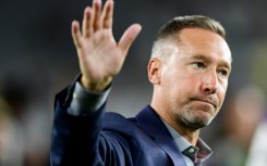 American Caleb Porter, a two-time MLS champion coach, was named head coach of the MLS New England Revolution