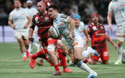 Racing 92's Nolann Le Garrec (C) scored three tries in the win over Oyonnax