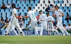 South Africa's Nandre Burger (C) made an instant impact on his Test debut taking two Indian wickets