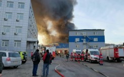 Fires and death after latest wave of Russian strikes on Ukraine