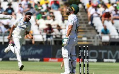 South African captain Dean Elgar (R) was one of six victims for India's Mohammed Siraj