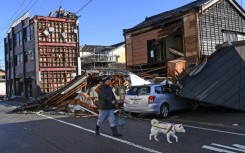 The quake tore whole facades off three-storey structures