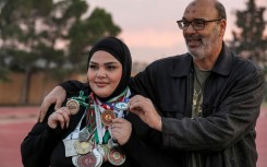 Salem al-Sayeh coaches and mentors his daughter
