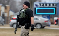 Police respond to a school shooting in Perry, Iowa