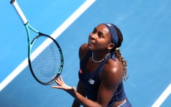 Coco Gauff throws up her racquet during her women's singles semi-final match against compatriot Emma Navarro