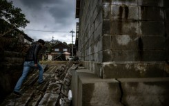 Masaki Sato has bought several of the houses which would otherwise be torn down with the village facing decline due to an ageing population