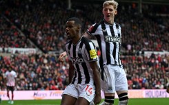 Newcastle's Alexander Isak (L) celebrates scoring against Sunderland