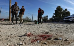Blood stains remain near the spot where an explosive device killed an Israeli officer during an Israeli raid in Jenin, the occupied West Bank 