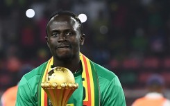 Senegal star Sadio Mane with the Africa Cup of Nations trophy after winning the 2022 final against Egypt