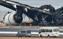 All 379 passengers and crew on the airliner were swiftly evacuated, but five of the six crew died on the smaller plane