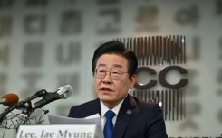 South Korean opposition leader Lee Jae-myung called for more peaceful politics after he was attacked by a knife-wielding man in Busan