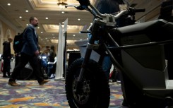 A man walks past an e-bike  at the The Mirage resort during the Consumer Electronics Show (CES) in Las Vegas