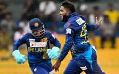 Leg-spinner Wanindu Hasaranga (R) took 7-19 as Sri Lanka skittled Zimbabwe for 96 in the third and final OCI against Zimbabwe in Colombo