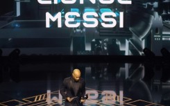 Thierry Henry collected The Best FIFA Men's Player award on behalf of the absent Lionel Messi