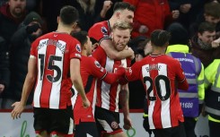 Oli McBurnie (centre) scored a 102st-minute penalty to salvage a 2-2 draw for Sheffield United