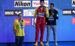Australia's Mack Horton (L) refused to stand on the podium with gold medallist Sun Yang (C) at the 2019 world championships