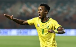 Themba Zwane celebrates his second goal for South Africa against Namibia.
