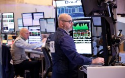 Traders are tracking a deluge of corporate results this week