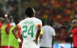 Ivory Coast forward Simon Adingra appears dejected at the end of his team's humiliating 4-0 loss to Equatorial Guinea on Monday