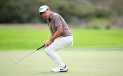Kevin Yu of Taiwan reacts to a missed putt on the way to the first-round lead in the US PGA Tour Farmers Insurance Open at Torrey Pines in La Jolla, California
