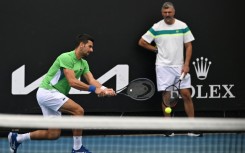 Novak Djokovic attends a training session ahead of his Australian Open semi-final