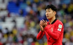 Son Heung-min applauds South Korea fans in Qatar