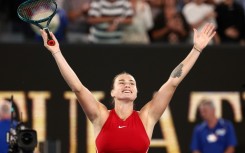Aryna Sabalenka celebrates after victory against Zheng Qinwen in the Australian Open final