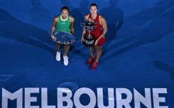 China's Zheng Qinwen (left) lost to Aryna Sabalenka in the Australian Open final