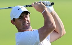 Rory McIlroy of Northern Ireland says PGA Tour titles are cheapened when many of the world's top players are banned after jumping to rival LIV Golf and merging the tours is more important than punishing defectors who seek a return