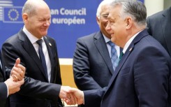 Hungarian PM Viktor Orban dropped his veto  on the EU's 50-billion-euros aid package for Ukraine