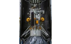 This handout picture from NASA shows the Nova-C lunar lander encapsulated within the fairing of a SpaceX Falcon 9 rocket in preparation for launch